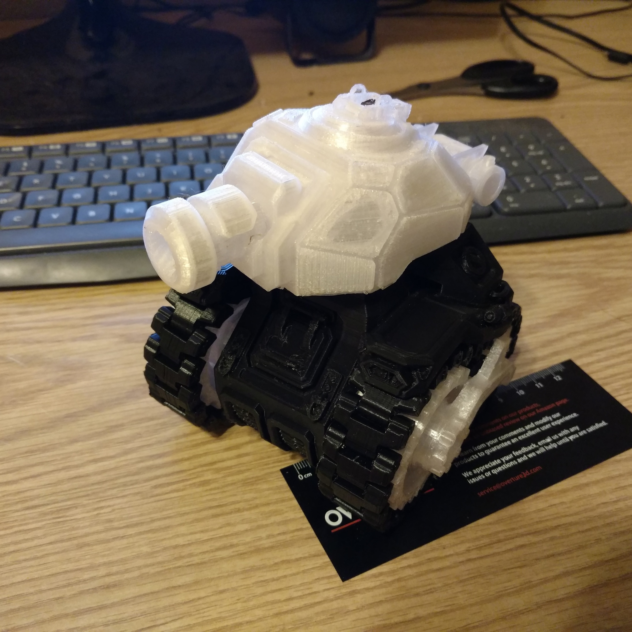 A 3D printed tank toy facing the camera.